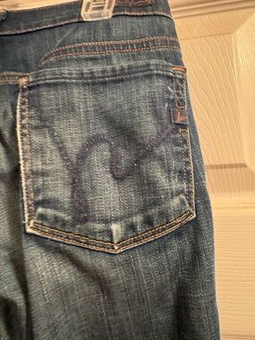 Levi's blue denim jeans with orange topstitching